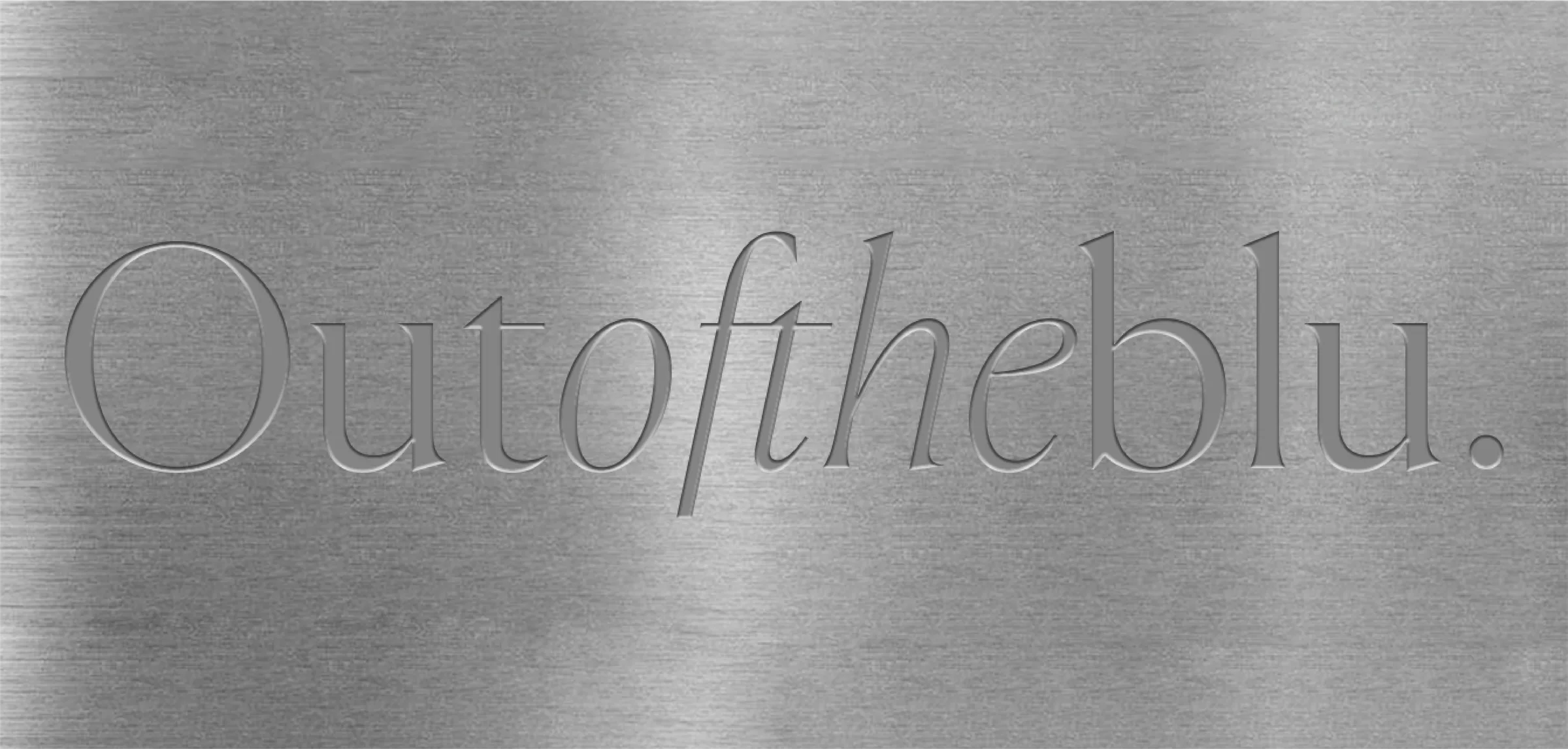 “Outoftheblu.” embossed on a brushed metal plate.